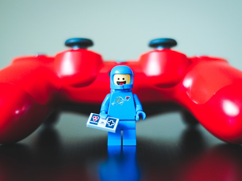 Close-up of a controller bathed in indigo and toxic-green light